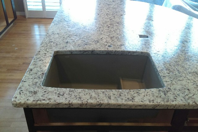 Bianco santa cecilia granite with leathered finish and double radius edges 601